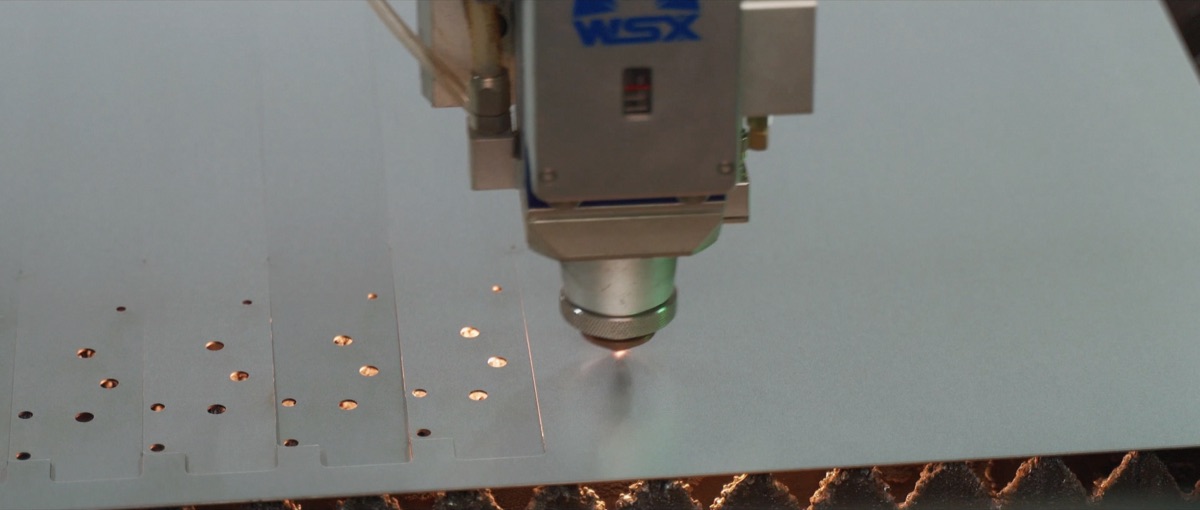 Laser processing of sheet-metal openings