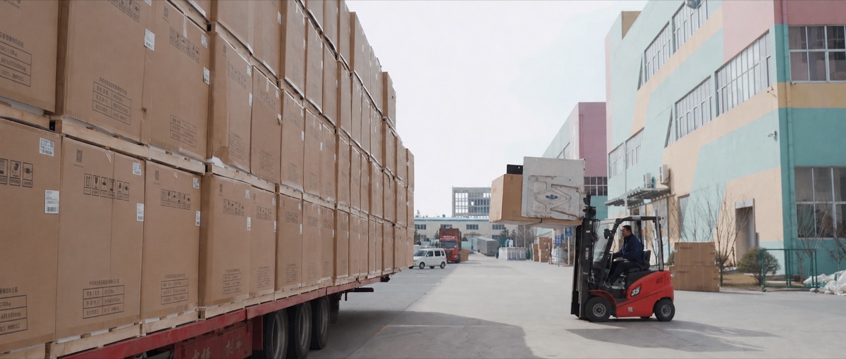 Forklift transfer of cartoned refrigeration equipment