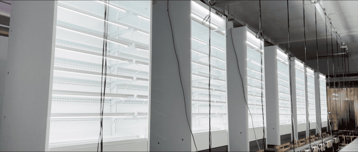 Display cabinets connected for powered inspection